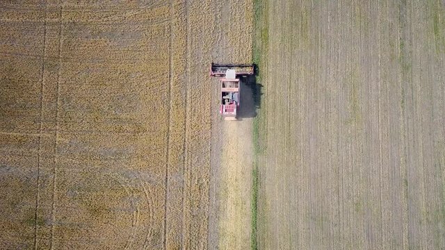 Farm machinery on the field. Agricultural landscape from the air