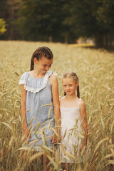 young girl in the yellow field