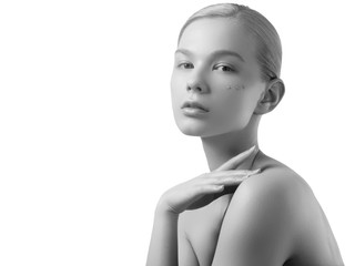 Black and white. Beauty woman face portrait. Beautiful spa model girl with perfect fresh clean skin. Cute woman face close up studio on white black and white