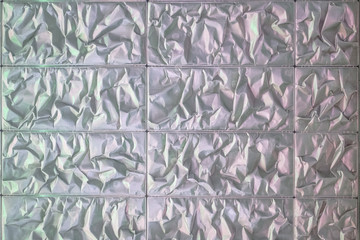 abstract metallic gray texture with folds and creases