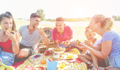 Happy families doing picnic in nature park outdoor