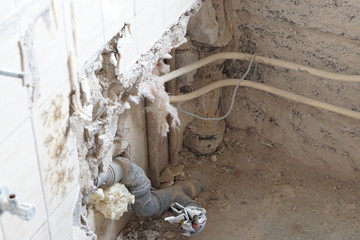 opened walls in bathroom