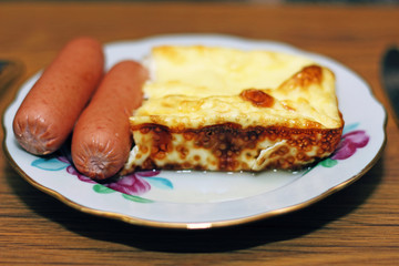 two sausages and an omelette for breakfast