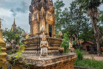 golden stupa in a buddhist temple in cambodia