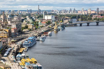 Zelfklevend Fotobehang KIEV - UKRAINE - Juluy 2018. View to river dnipro and tourist boats. © Maksym