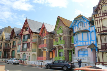 Fototapeta na wymiar beautiful row of ancient houses in le treport, normandy, france along the boulevard
