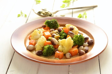 Broccoli, cauliflower, squash and beans with pumpkin seeds
