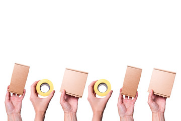 Many hand handing cardboard box and roll