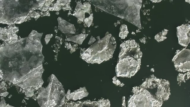 Flight over of iced river, drifting ice - Budapest, Danube river
