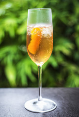 orange liqueur and champagne cocktail in glass