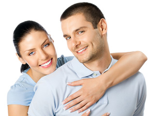 Fototapeta premium Young happy couple, over white