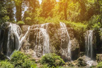 soft water of the stream in the natural park, Beautiful waterfall in rain forest