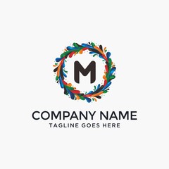 Letter M with colorful circle logo design
