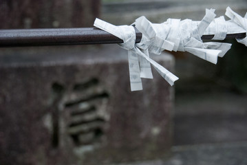 Japan wishing paper knot, a stone with chinese calligraphy, meaning belief