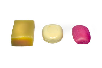 several pieces of soap on white background
