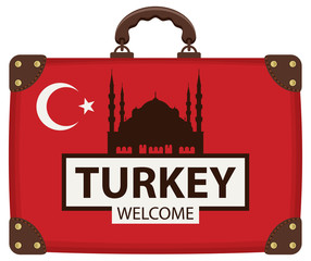 Vector travel banner with suitcase in colors of Turkish flag with the Hagia Sophia and inscription Turkey welcome