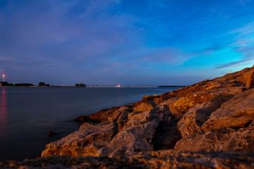 Fototapeta na wymiar Rocks and Water on Lake Erie Sunset