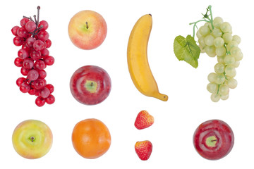 set of different decorative dummy fruits isolated on white background. plastic apples, banana, grape, orange and strawberry for kids play or decoration