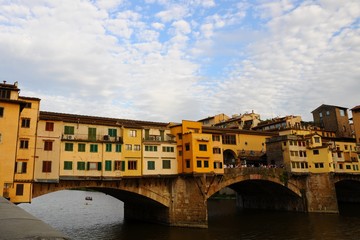Ponte Vecchio known as Old Bridge - Famous medieval stone arch bridge over the Arno River, in Florence, Italy