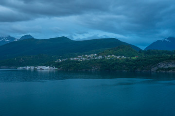 little village in the fjords of norway geiranger early in the morning