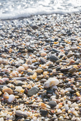 Sea stones on the seashore in the summer
