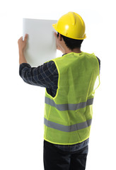 Construction concept,Asian Engineer working with drawings paper isolated on white