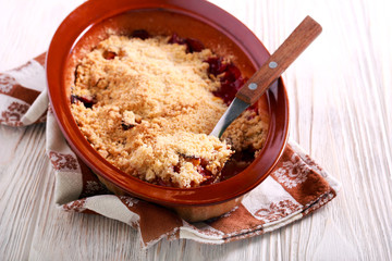 Fruit crumble cake in baking tin