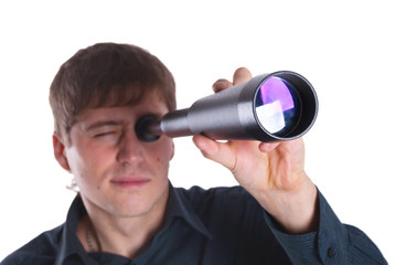 Fototapeta na wymiar man looking through a telescope