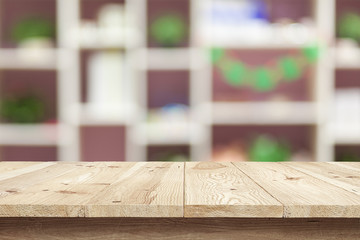 Wooden tablet on interior background