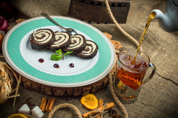 Chocolate roll with coconut filling.