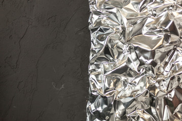 Full frame take of a sheeT of crumpled silver aluminum foil