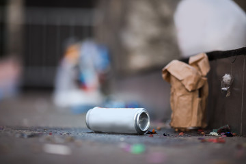Close-up of debris in bags, bottles, cans from under alcohol after events and concerts.