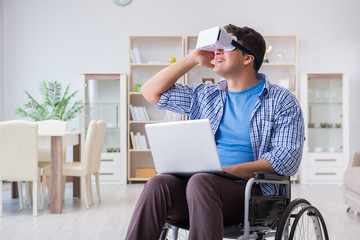 Freelance student studying with laptop and virtual reality glass
