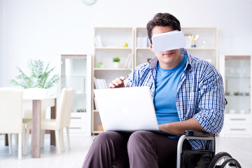 Freelance student studying with laptop and virtual reality glass