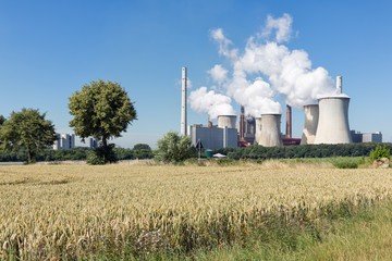 Fototapeta na wymiar View at Coal-fired power plant near lignite mine garzweiler in Germany