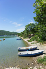 Naklejka na ściany i meble Rent boats for skiing and fishing on the picturesque mountain lake Abrau-Durso