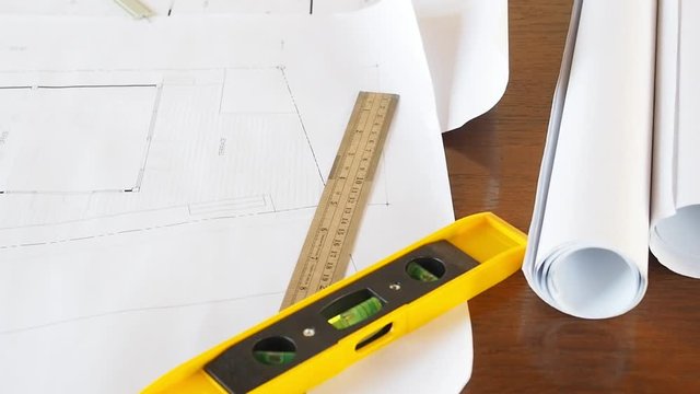 Measurement tool with blueprint, architectural concept. tilt up