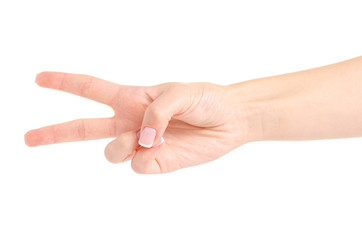 Female hand two fingers on white background isolation
