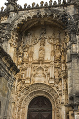 Fototapeta premium Sculpture of the Virgin and Child above the Entrance of the Round Templar Church of the Convent of Christ, Tomar