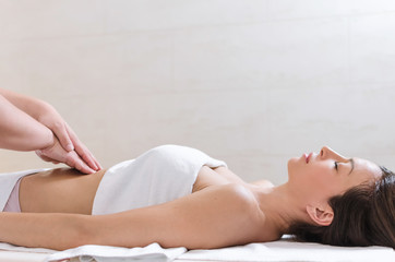 Abdomen massage at spa