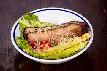 Roasted pork with salad