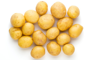 New potato and rosemarin isolated on white background close up.
