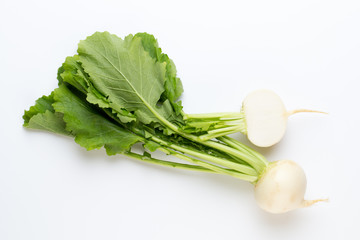 Fresh white round turnip radish on white background.