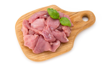 Raw chopped beef meat pieces isolated om white background cut out.
