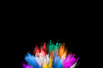 abstract colored dust explosion on a black background.abstract powder splatted background,Freeze motion of color powder exploding/throwing color powder, multicolored glitter texture.