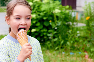  The child is eating ice cream.