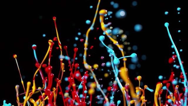 Colorful splashing paint in super slow motion. Shot with high speed cinema camera, 1000fps