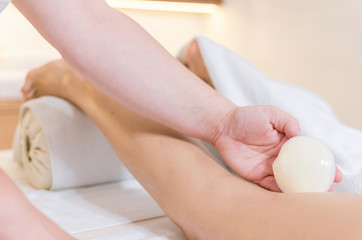 Obraz na płótnie Canvas Leg massage at spa