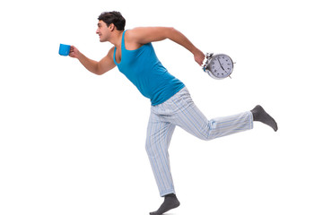 Man waking up with alarm clock isolated on white