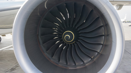 Close up of a jet engine turbine blades.